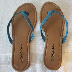 Redvolution flip flops Size 7 w/sky blue straps